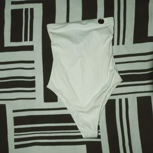 One piece white bathing suit